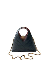Four quilted leather handbags