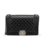 A black quilted leather shoulder bag