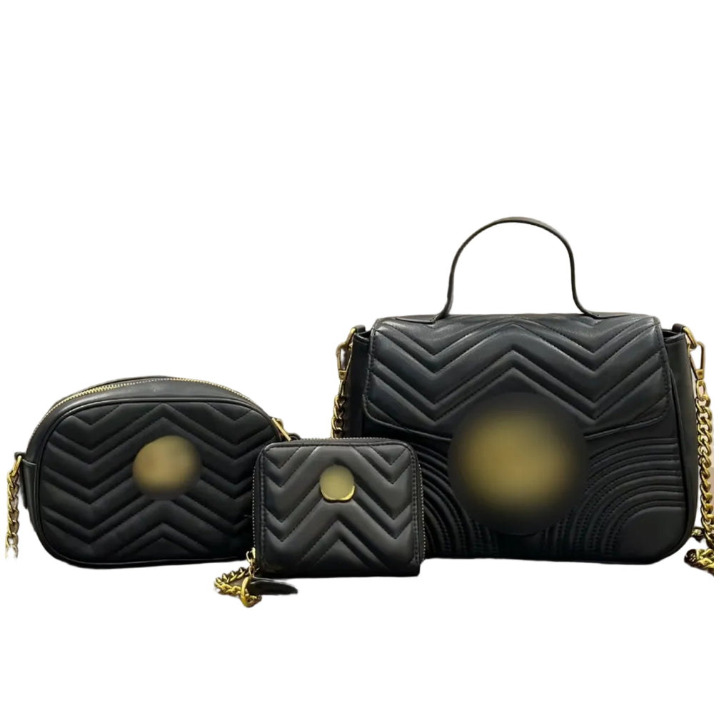Three black quilted handbags