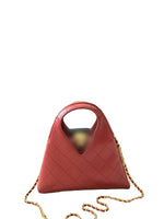 Four quilted leather handbags