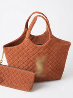 A brown quilted tote bag
