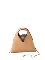 Four quilted leather handbags